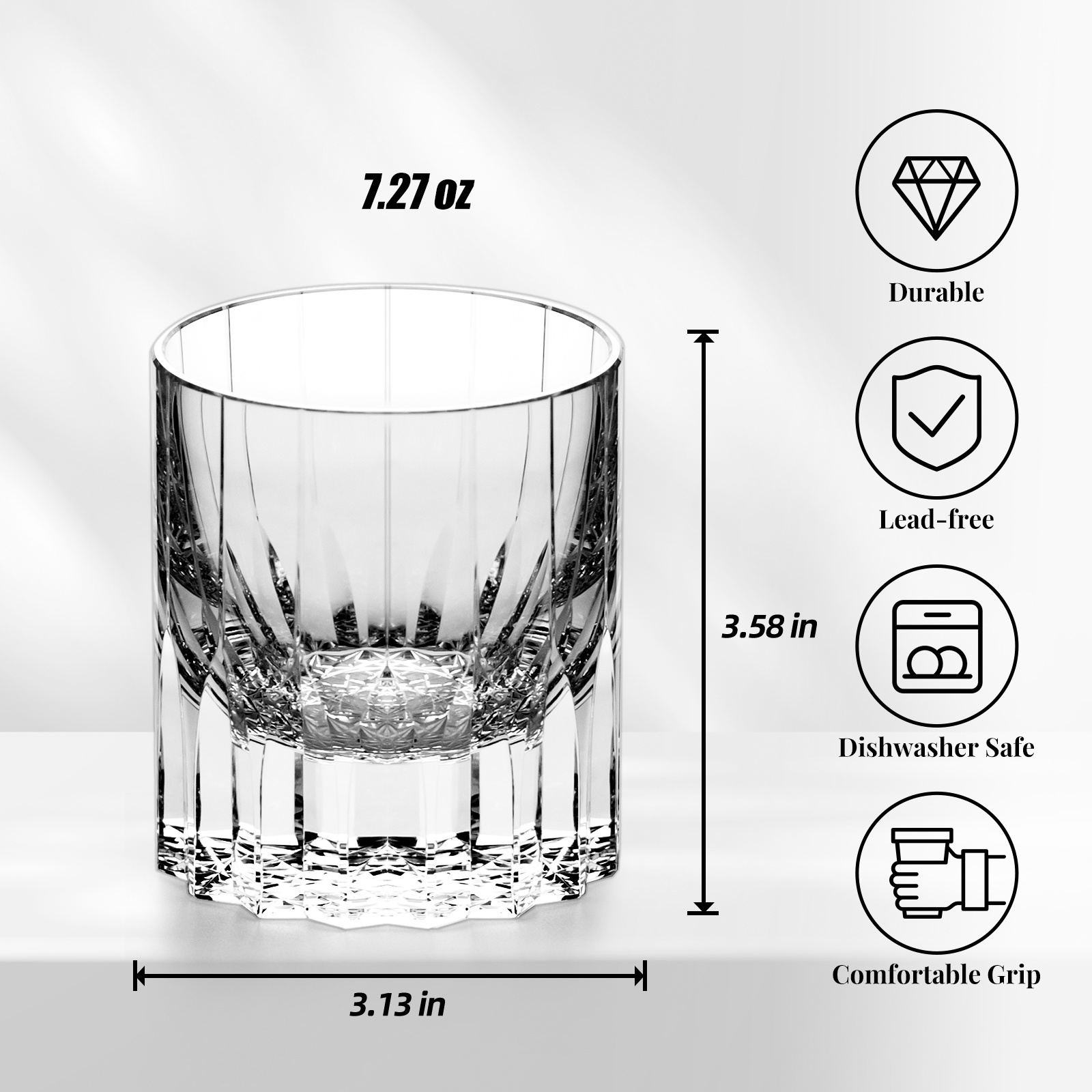 Crystal whiskey glasses with intricate etching and thick base