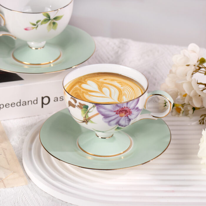4.1 Ceramic Tea Cup and Saucer Set with Gold Trim, Passionflower - Image 1
