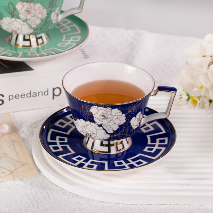 Ceramic Tea Cup and Saucer Set with Gold Trim - Image 5