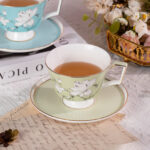 Ceramic Tea Cup and Saucer Set with Gold Trim - Image 2