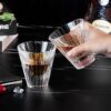 KAMMAK Whiskey Glasses Set of 2, 5.07 oz (150 ml) Hand Blown Crystal Tumbler with Delicate Rim, Thick Base & Seamless Design for Neat Scotch, Bourbon, and Craft Cocktails KAMMAK 7KPSP919N whiskey glasses side angle view showing silhouette