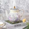 KAMMAK Teapot with Handle, Vintage Porcelain Tea Pot with Gold Trim, Blooming & Loose Leaf Teapot, Festive Holiday Serveware, Gifts for Women, Lilac 27 oz KAMMAK 8CZYX014 ceramic teapot side angle view showing silhouette