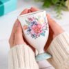 KAMMAK Bone China Mugs Set of 2 Fine Ceramic Coffee Mug, 6.7oz Porcelain Novelty Coffee Mugs for Cappuccino, Latte, Coco, Americano, Floral Small Tea Cups KAMMAK 8CZJBE013 ceramic cup and saucer close-up material texture detail image 4
