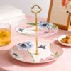 KAMMAK 2 Tier Porcelain Cupcake Stand Serving Tray, Dessert Plates Cake Fruit Candy Display Tower, Reusable Pastry Platter for Wedding Birthday Baby Shower Tea Party Decorations... KAMMAK 8CZNX003 decorative serving plate front view for product display