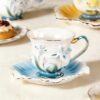 KAMMAK Tea Cups and Saucers Set of 2, Porcelain Coffee Cups, Stackable Espresso Mugs, Ceramic Demitasse for Coffee, Latte, Americano, Tea, Relief Yellow + Blue KAMMAK 8CZNX015+16 ceramic cup and saucer close-up material texture detail image 4