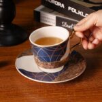 KAMMAK Tea Cups and Saucers Set of 2, Porcelain Coffee Cups, Stackable Espresso Mugs, Ceramic Demitasse for Coffee, Latte, Americano, Tea, Golden Age