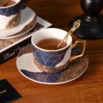 KAMMAK Tea Cups and Saucers Set of 2, Porcelain Coffee Cups, Stackable Espresso Mugs, Ceramic Demitasse for Coffee, Latte, Americano, Tea, Golden Age
