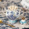 KAMMAK Ceramic Creamer and Sugar Set, Creamer Pitcher and Sugar Container, White Cream & Sugar Sets for Coffee Milk Sauces Salad, Sugar Bowl with Lid for Coffee Bar, Porcelain... KAMMAK 8KPGH001+02 ceramic teapot side angle view showing silhouette