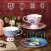 KAMMAK Tea Cups and Saucers Set of 2, Fine Bone China Coffee Cups, Stackable Espresso Mugs, Ceramic Demitasse for Coffee, Cappuccino, Latte, Americano, Tea, Flowers (Blue + Pink) KAMMAK 8KPGH019+20 ceramic cup and saucer side angle view showing silhouette