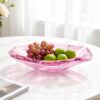 KAMMAK Crystal Glass Fruit Bowl, Hand Blown Decorative Dessert Plate | Pink, Luxury Centerpiece, Aesthetic Counter Decor, Colored Modern Art, For Party, SXY12 KAMMAK 8GPSXY012 decorative serving plate side angle view showing silhouette
