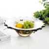 KAMMAK Glass Fruit Bowl, Luxury Centerpiece Glass Bowl, Hand Blown Decorative Dessert Plate, Green Aesthetic Counter Decor, Colored Modern Art Serving Bowls for Party (SXY03) KAMMAK 8GPSXY003 decorative serving plate side angle view showing silhouette