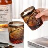 KAMMAK Whiskey Glasses Set of 2, Handcrafted Japanese Cut Glass | 260ML,Old Fashioned, Stemless, For Bourbon, Scotch, Spirits & Cocktails, Perfect Men & Women Gift, Amber Black,... KAMMAK 8KPRS007 whiskey glasses close-up material texture detail image 4