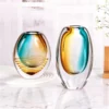 KAMMAK Amber Aqua Oval Hand-Blown Art Glass Vase - SYX023 - product image 5 KAMMAK 8HPSYX023 glass vase styled on dining table image 5