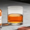 Single clear KAMMAK 777N whiskey glass filled with amber spirits KAMMAK 7KPSP777N whiskey glasses shape and proportion detail image 3