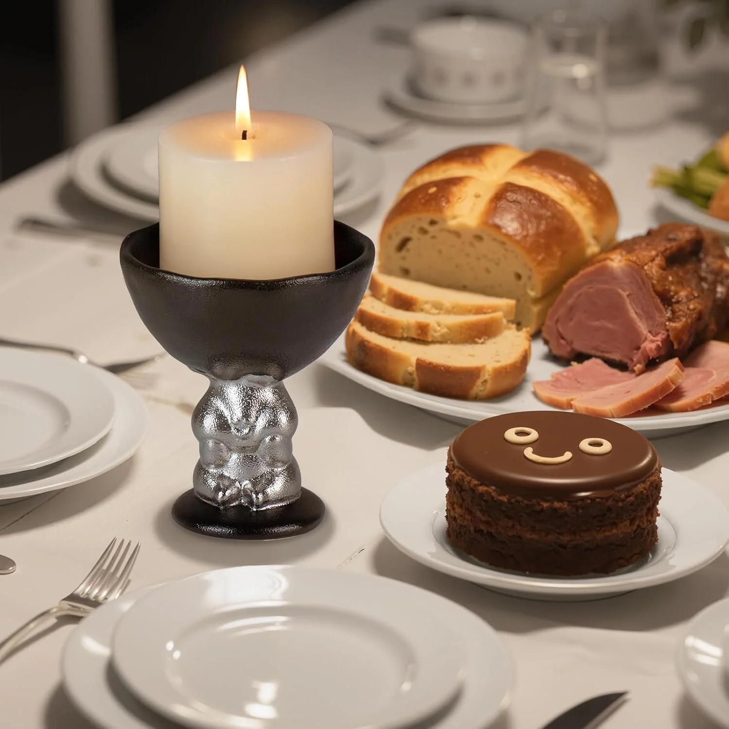 Black rabbit candle holder displayed on a dining table