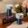 Pair of blue ceramic pedestal cups in a tea setting KAMMAK 7KPSP706N ceramic cup and saucer styled home decor setting image 5