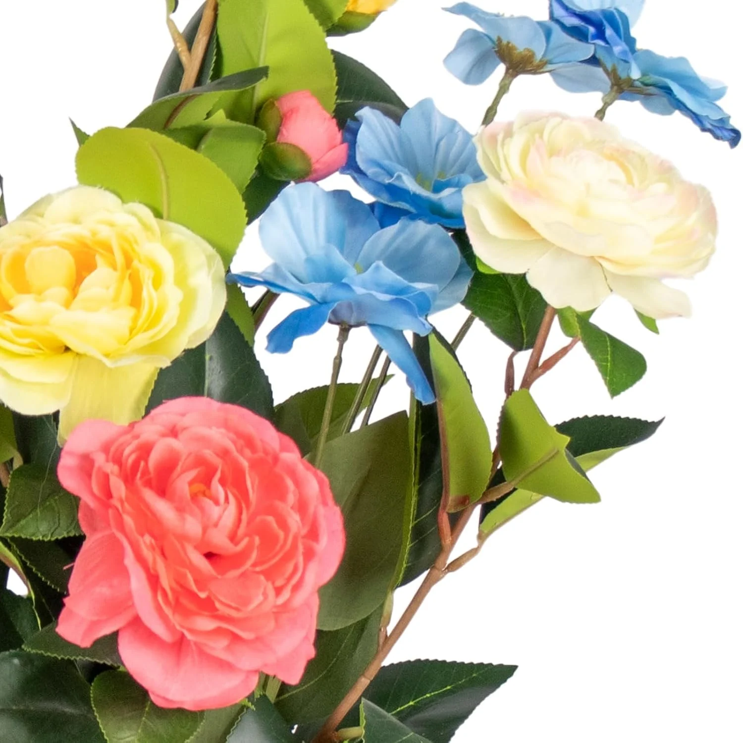 Close-up of yellow coral cream and blue artificial blooms