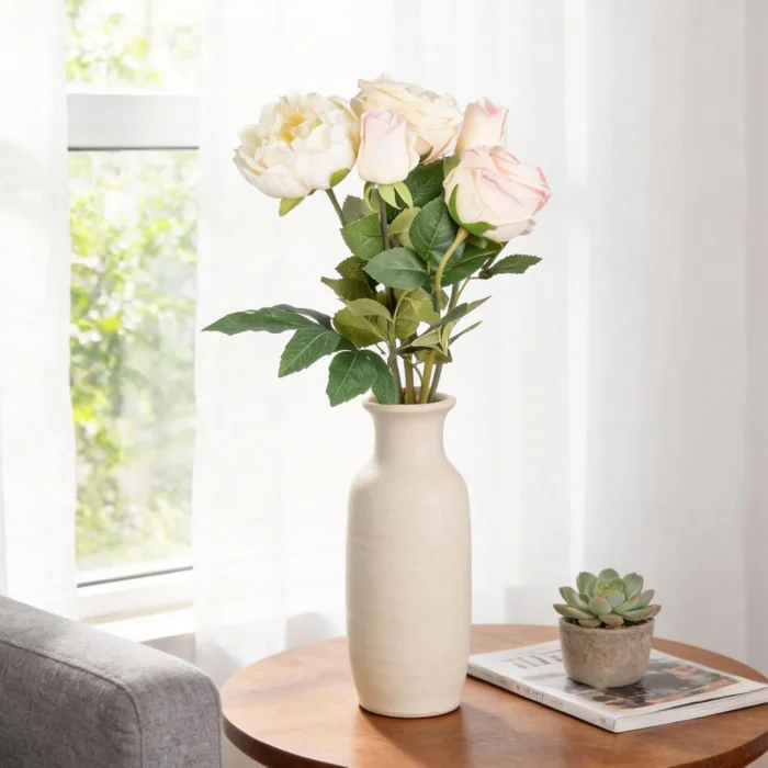 Cream rose bouquet in a neutral vase on a round table KAMMAK 8KPFZH010 home decor product scale and proportion view image 6