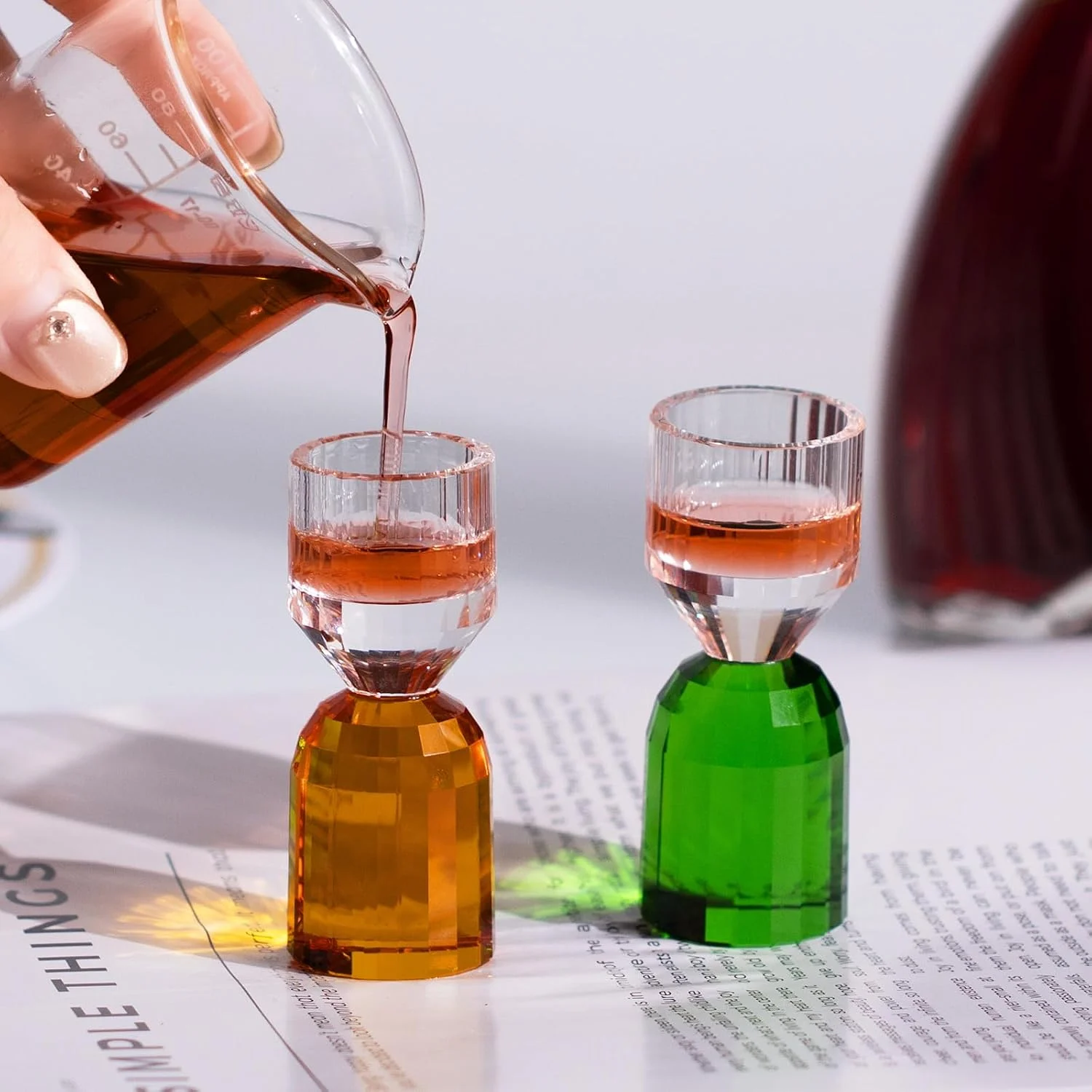 Spirit poured into a green-base crystal shot glass