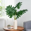 Large green foliage leaves arranged in a cream table vase KAMMAK 8KPFZH003 home decor product scale and proportion view image 6