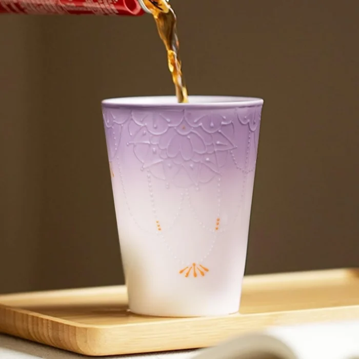 Beverage poured into an embossed lavender ceramic cup KAMMAK 7KPSP720N home decor product close-up material texture detail image 4