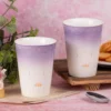 Two tall lavender-and-white ceramic cups together KAMMAK 7KPSP720N home decor product styled home decor setting image 5