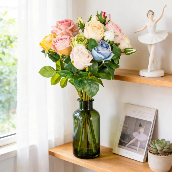 Pastel rose bouquet arranged in a green glass bottle KAMMAK 8KPFZH012 home decor product styled home decor setting image 5