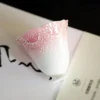 Pink-and-white scalloped ceramic tea cup at an angle KAMMAK 7KPSP696N+697N ceramic cup and saucer shape and proportion detail image 3