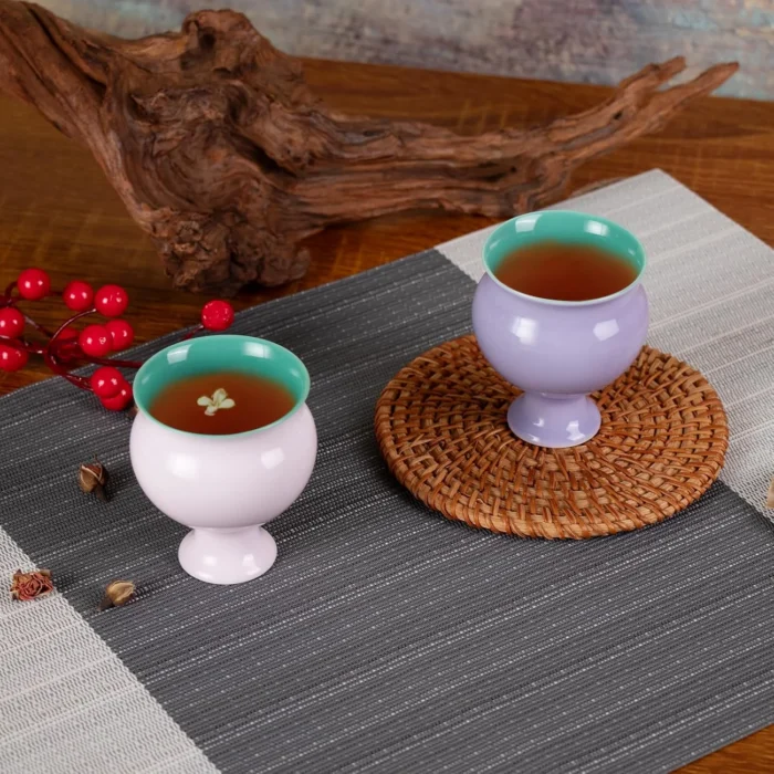 Pink and purple stemmed tea cups served with tea KAMMAK 7KPSP676N+677N ceramic cup and saucer shape and proportion detail image 3