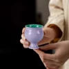 Hibiscus purple ceramic tea cup held in one hand KAMMAK 7KPSP676N+677N ceramic cup and saucer decorative craft detail image 7