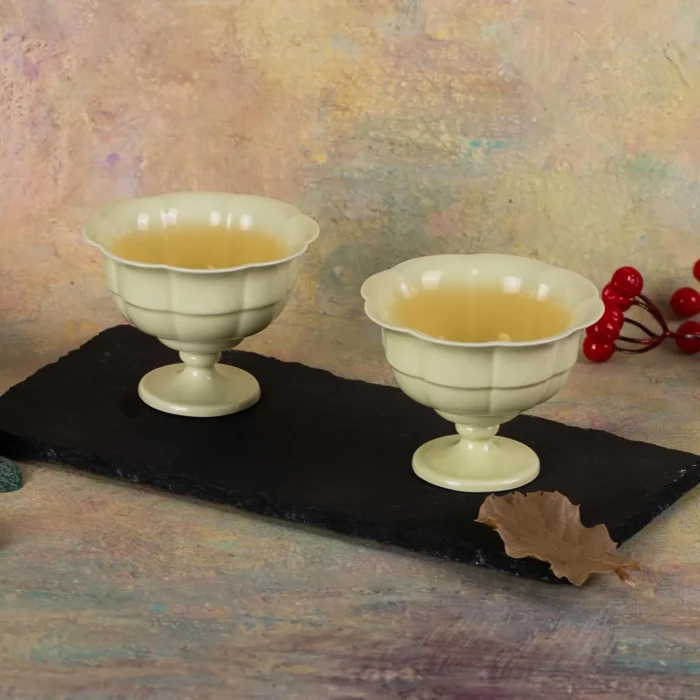 Two reed green pedestal tea cups served with tea KAMMAK 7KPSP701N ceramic cup and saucer shape and proportion detail image 3