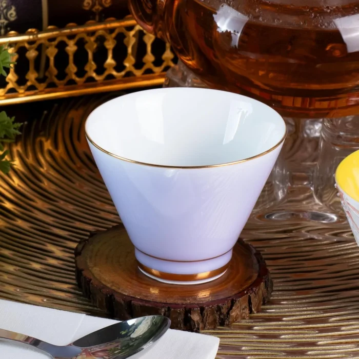 Single lavender KAMMAK tea cup with white interior and gold-tone rim KAMMAK 7KPSP432N ceramic cup and saucer close-up material texture detail image 4
