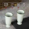 KAMMAK 718N pale green footed cups with care guidance icons KAMMAK 7KPSP718N ceramic cup and saucer side angle view showing silhouette