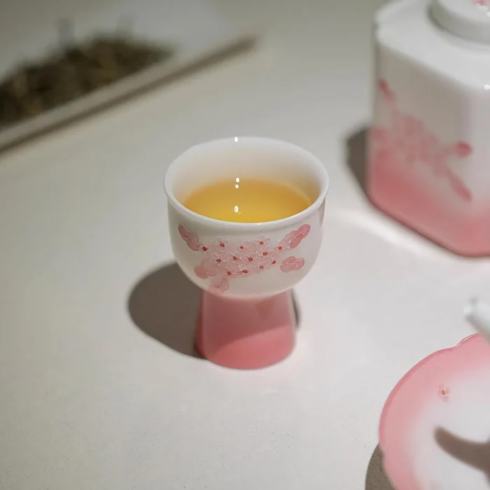 Single KAMMAK 714N pink floral footed cup filled with tea KAMMAK 7KPSP714N ceramic cup and saucer styled home decor setting image 5