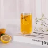 Single KAMMAK 766N highball glass with an orange citrus drink KAMMAK 7KPSP766N home decor product scale and proportion view image 6