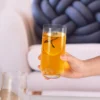 KAMMAK 766N slim highball glass held with an iced orange drink KAMMAK 7KPSP766N home decor product decorative craft detail image 7