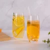 Two KAMMAK 771N tapered glasses with yellow citrus drinks KAMMAK 7KPSP771N home decor product styled home decor setting image 5
