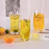 Assorted clear highball glasses arranged with citrus beverages KAMMAK 7KPSP771N home decor product scale and proportion view image 6