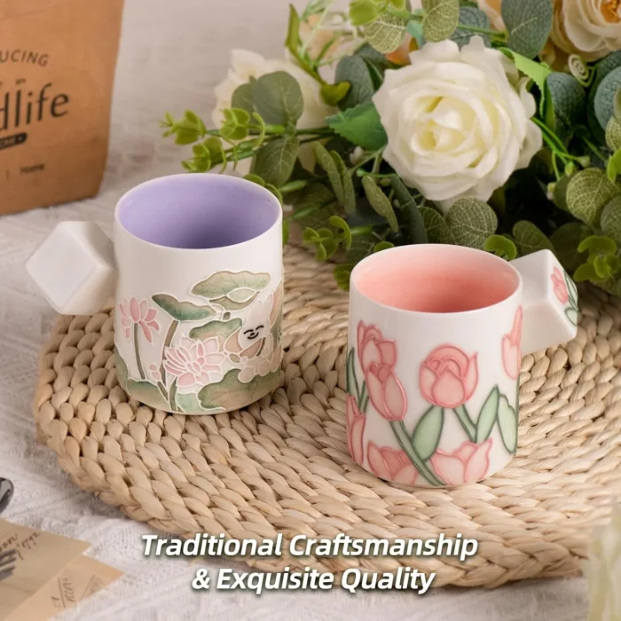 KAMMAK floral tea mugs displayed together among soft flowers KAMMAK 7KPSP434N ceramic cup and saucer side angle view showing silhouette