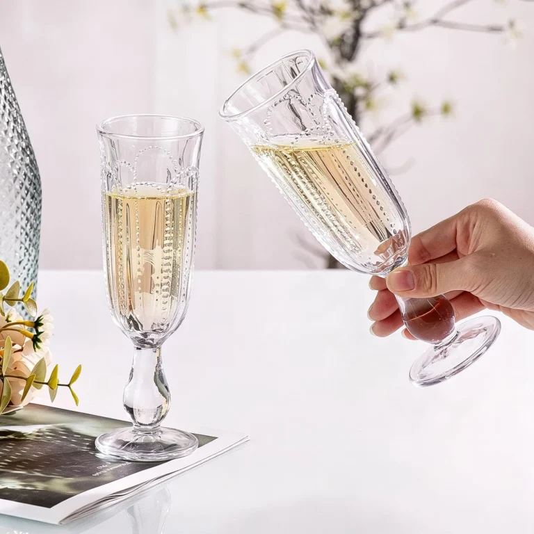 Embossed champagne flute pair with polished thin rims